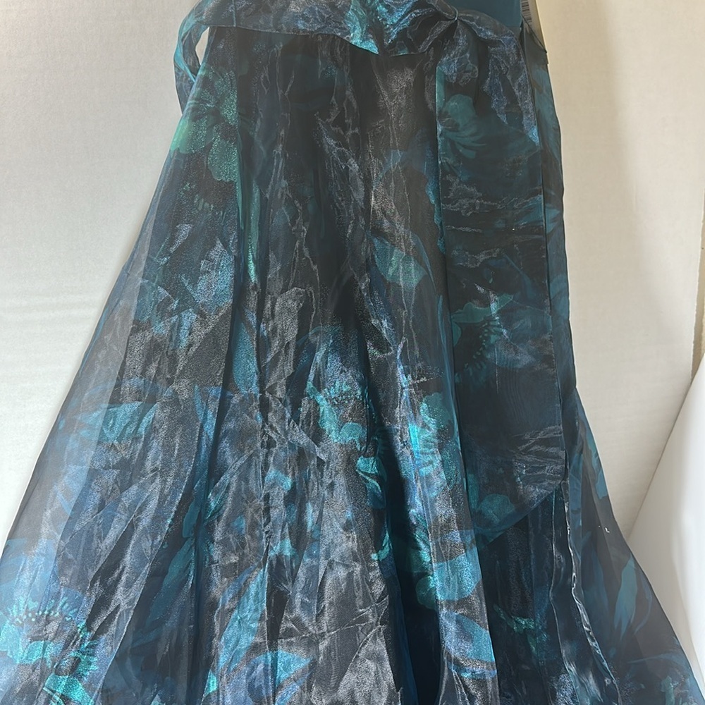 Mixed Media Sleeveless A-Line Gown
Eliza J - Picture 6 of 11
